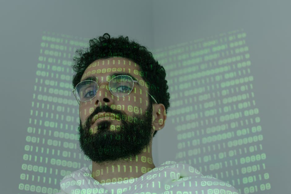 Image of a computer screen with binary code and a lock representing cybersecurity